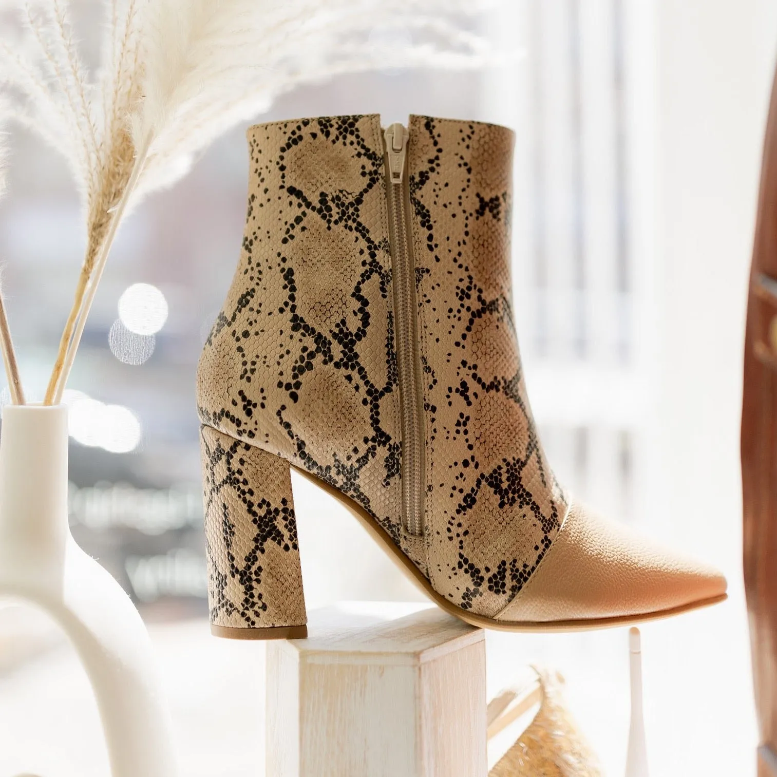 Nukamaku heeled boot in arequipe/sand snakeskin embossed leather